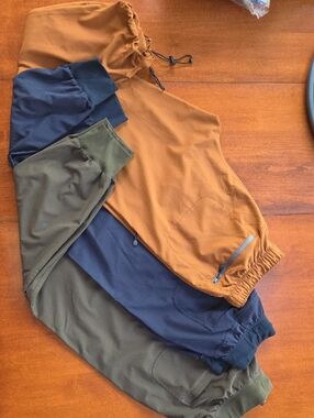 Three Casual Drawstring Joggers in Terra Cotta, Navy, and Olive